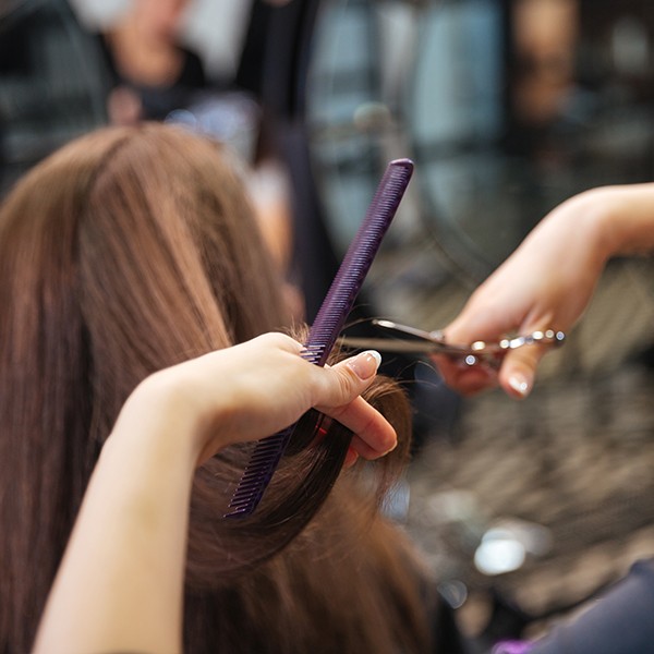 Woman getting a haircut